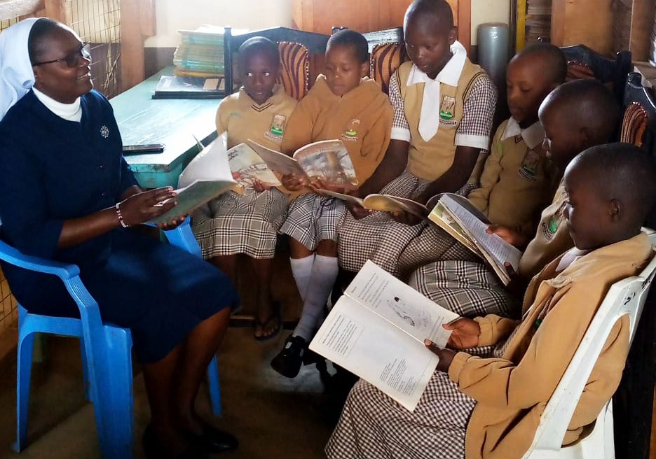 Sister Stella Maris teaching kids